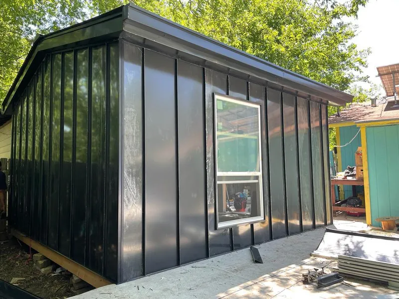 Black standing seam metal wall panels for Metal Roof Installation in Leawood