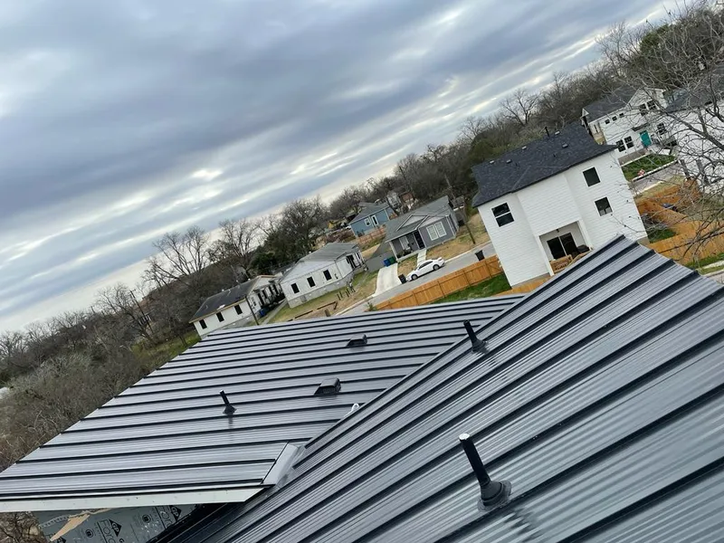 Standing seam metal roof panels with vents for Skylight Repair in Leawood